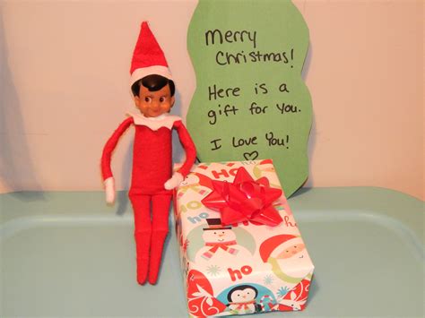 elf holding present|elf gift ideas 2024.